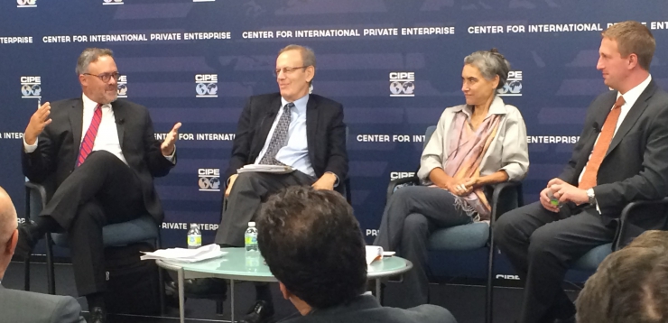 From left to right: moderator Christian Caryl, and panelists Carl Gershman, Sarah Chayes, and Eric Hontz